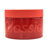 Glossier Crème de You body butter jar close-up for quick, luxurious hydration.