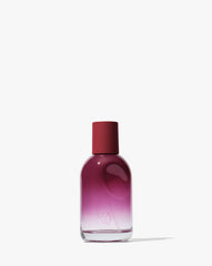 Glossier You Reve bottle close-up showcasing skin-scent enhancement and warm gourmand notes.