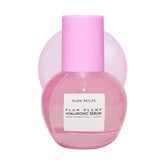 Glow Recipe Plum Plumping Serum bottle pouring for lightweight hydration and glow.