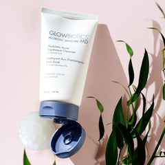 Glowbiotics clarifying cleanser closeup label—probiotic base supports balanced skin microbiome.