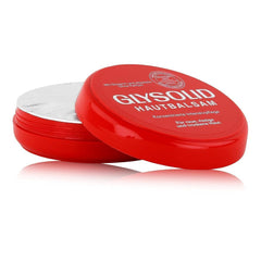 Glysolid hand-application on dry skin demonstrates gentle hydration.
