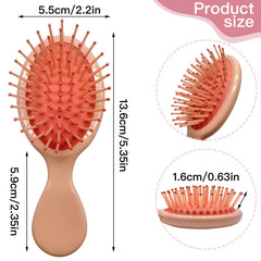 Goiio mini detangling brush with soft air cushion teeth for gentle detangling.