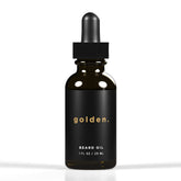 Golden Grooming Beard Oil bottle demonstrates lightweight hydration for daily conditioning.