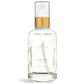 Goldie Locks Signature Serum frizz-control bottle pour enhances sleek, long-lasting shine.