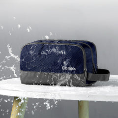Gonex travel toiletry bag main compartment holds larger bottles for trips.