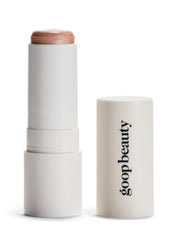 goop Beauty Glow Skin Highlighter Stick on application shows pearlescent glow for radiant skin.