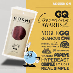 GOSHI Exfoliating Towel in shower scene demonstrates full-body coverage for easy cleansing.