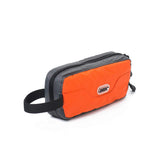 GOX travel toiletry bag orange closed displays compact travel organization for cosmetics.
