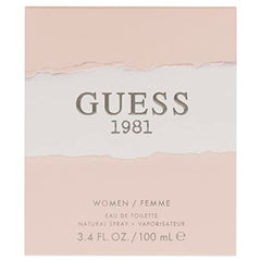 Guess 1981 bottle on dresser ready for daily rituals and confident wear.