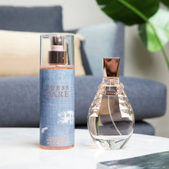 GUESS Dare spray-action shows easy application for romantic evenings.
