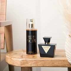 Close-up of amber floral notes for GUESS Seductive Noir suggesting luxurious evening mood