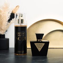 GUESS Seductive Noir spray dispense image illustrating easy application and light mist