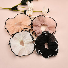 Guqqeuc big hair scrunchies brown, adds elegant touch to ponytails.
