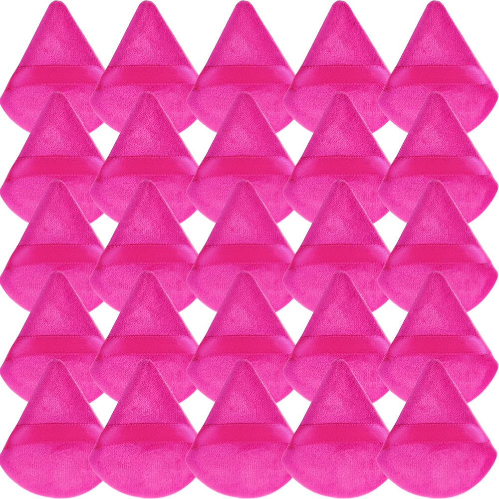 GXXMEI pink triangle powder puff shows precise foundation coverage on the skin.