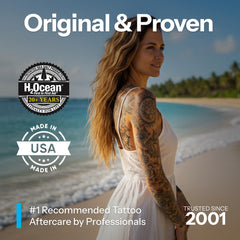 H2Ocean Blue Green Foam Soap applying lather to tattoo area during routine