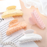 HairChrysm 4.2-inch white claw clip provides secure grip for fine hair, ideal for everyday wear.