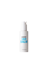 Hairstory Hair Balm jar labeled for moisture and shine.