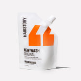 Hairstory New Wash Original bottle; detergent-free cleansing for all hair types.