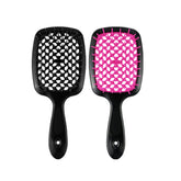 HaiSun Lixera detangling brush pink detangles curly hair with minimal pulling.