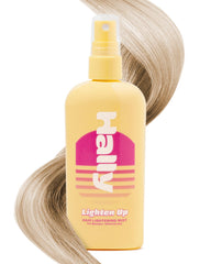 Hally Hair Lightener Spray on sun-kissed hair reveals subtle highlights.
