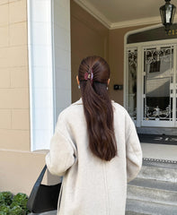 Hana Mia travel-friendly burgundy clip fits purse or bag.