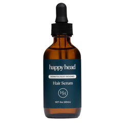 Happy Head hair regrowth serum bottle with dropper for easy daily scalp hydration.