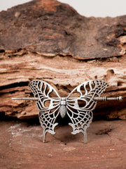 HAQUIL butterfly hairpin styled in an elegant updo