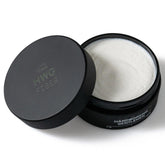 Hardworking Gentlemen mid-high hold pomade jar closeup highlights matte finish and natural ingredients.