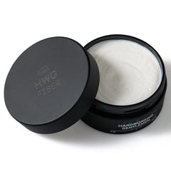 Hardworking Gentlemen mid-high hold pomade jar closeup highlights matte finish and natural ingredients.