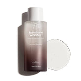 HARUHARU Wonder Black Rice Toner bottle on vanity delivering refreshing hydration.