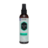 HASK Invigorating Tea Tree Oil 5-in-1 leave-in spray bottle refreshes hair and scalp.