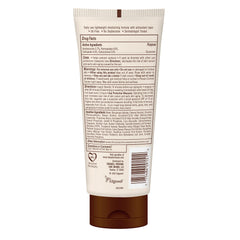 Hawaiian Tropic sunscreen lotion being squeezed from a pump for easy application.