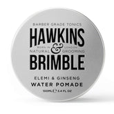 Hawkins & Brimble strong hold pomade bottle closeup demonstrates easy wash and natural shine.