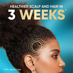 Head & Shoulders demonstrating scalp application on natural hair for soothing relief