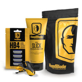 HeadBlade Moto razor in hand showing ergonomic grip for precise head shaving