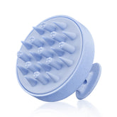 HEETA hair scalp massager with palm ergonomic design for comfortable, controlled cleansing.