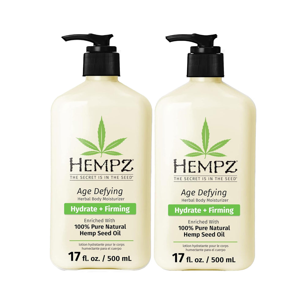 Hempz Age Defying bottle close-up highlighting deep hydration for daily skin care.
