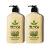 Hempz Sweet Pineapple & Honey Melon lotion packshot emphasizes two 17 oz bottles for daily moisturization