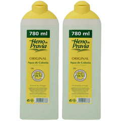 Heno de Pravia Original Agua de Colonia bottle pour showing fresh citrus aroma for daily refresh.