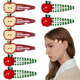 Heogacinlia red apple hair clip closeup shows rhinestones for sparkling style.