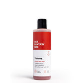 Her Fantasy Box Yummy Body Wash bottle on a shelf for indulgent, refreshing showers.