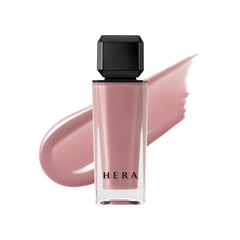 HERA Sensual Nude Lip Gloss 401 Nudist tube closeup showing sheer shine and hydration.