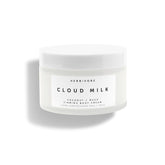 HERBIVORE Cloud Milk bottle close-up showcasing sleek packaging and quick absorption.