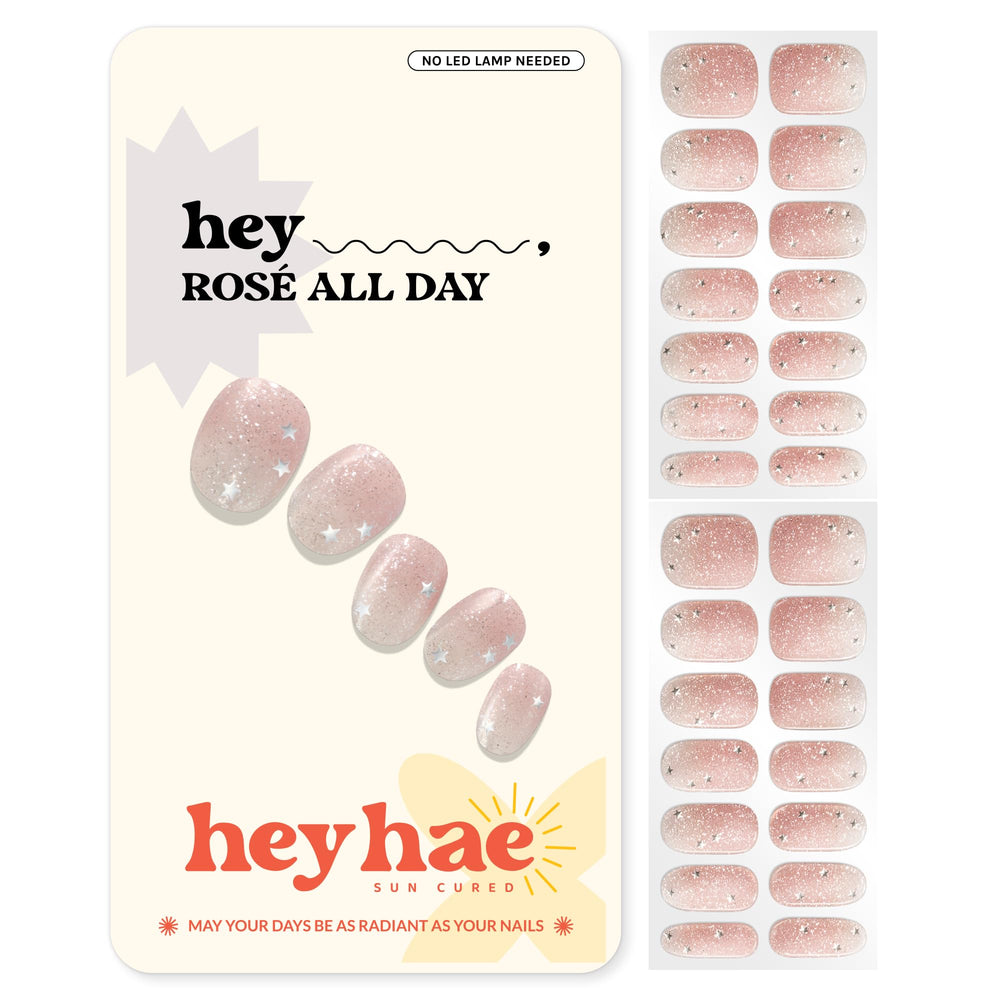 Heyhae semi-cured gel nail strips in rose champagne glitter for quick salon-quality manicures.