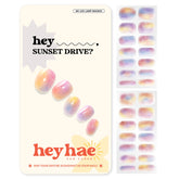 Heyhae semi-cured nail strips marble pink sunset drive deliver salon-quality manicure at home.
