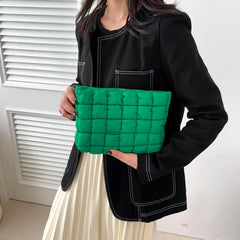 HFLZBRO Puffy makeup bag green open interior for easy access to cosmetics.