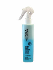 Hidra Hidro Active bottle pouring for instant hair hydration.