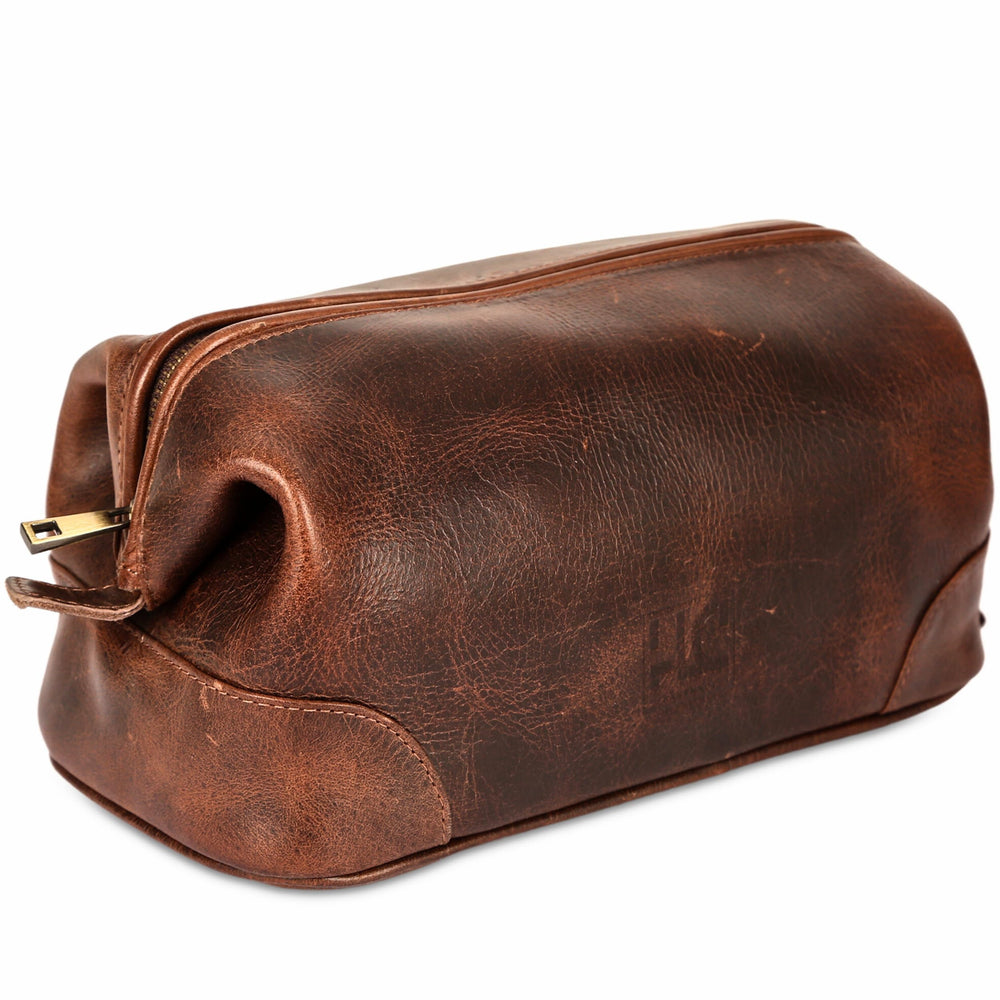 HLC leather toiletry bag brown closeup highlighting premium leather and craftsmanship