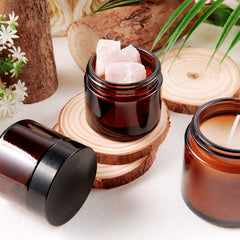 Hoa Kinh 2oz amber glass jar with lid provides compact cream storage.
