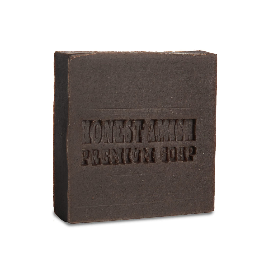 Honest Amish Patchouli Bark Soap bar closeup shows natural oils for a gentle cleanse.